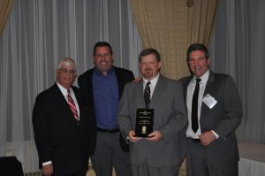 Pictured left-right: Delaware Secretary of Labor John McMahon, Nickle President/CEO Steve Dignan, Nickle Safety Director Mike Anderson, and DCA President Mike Berardi at the Governor's Safety Awards dinner.